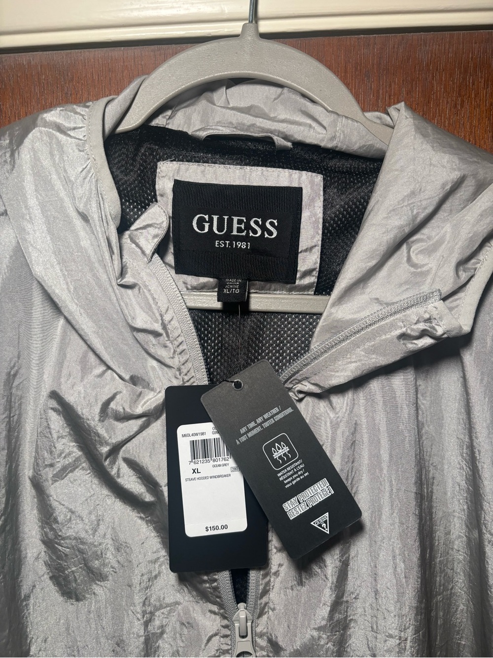 Guess metallic reflective silver rain jacket NWT men’s size XL